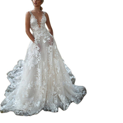 Robe de Mariée Princesse en Dentelle Florale – Élégance & Glamour